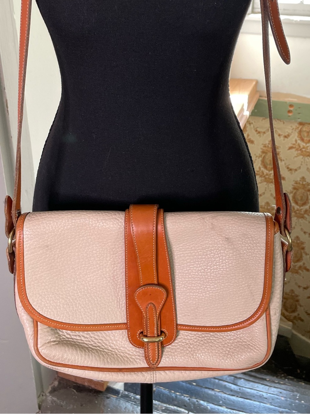 Dooney Bourke vintage crossbody light beige and tan. All-weather leather